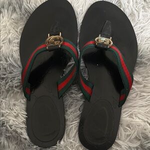 Black Flip Flops with Red and Green Straps